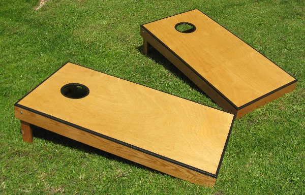 Cornhole boards on the grass